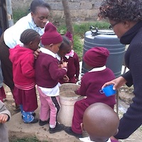 children eating breakfast at Excel Emmanuel School